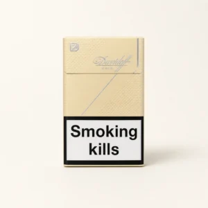 Davidoff Gold Cigarettes cigarette pack on a warm-white studio background